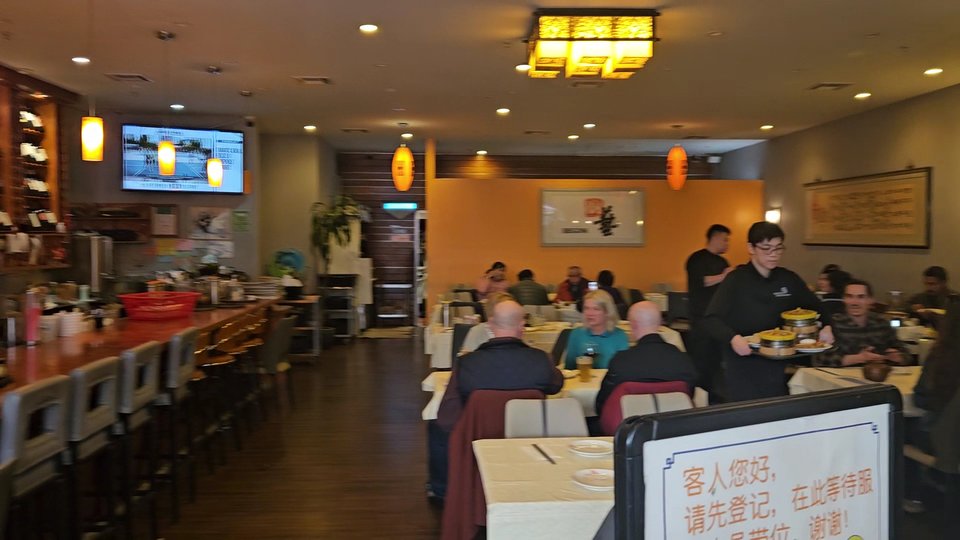 Chinese restaurant interior with clean, open seating.