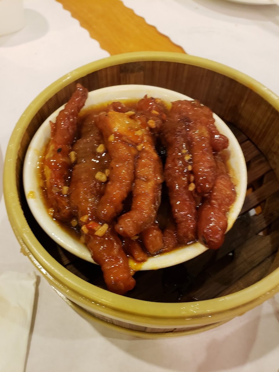 Menu page with dim sum and noodle dishes.