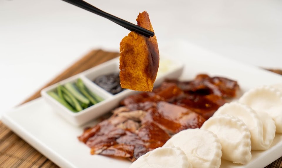 Chinese menu showing soups, rice, and vegetable plates.