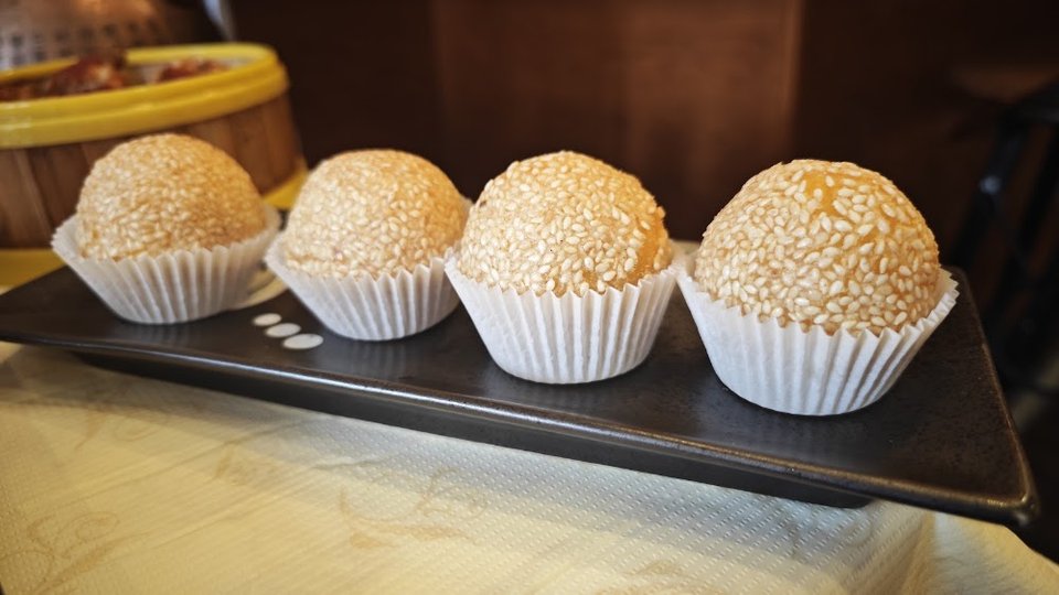 Restaurant menu with familiar dishes and small bites.